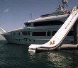 There you go, an inflatable water slide for your yacht