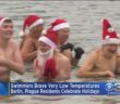 Swimmers Brave Very Low Temps To Celebrate Holidays