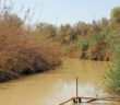 In video, masked assailants open fire on two men swimming in Jordan River