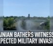 Ukrainian bathers witness unexpected military invasion