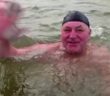 Siberians Go Swimming in Ice-Cold River