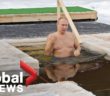 Russia’s Putin takes traditional Epiphany dip in icy waters