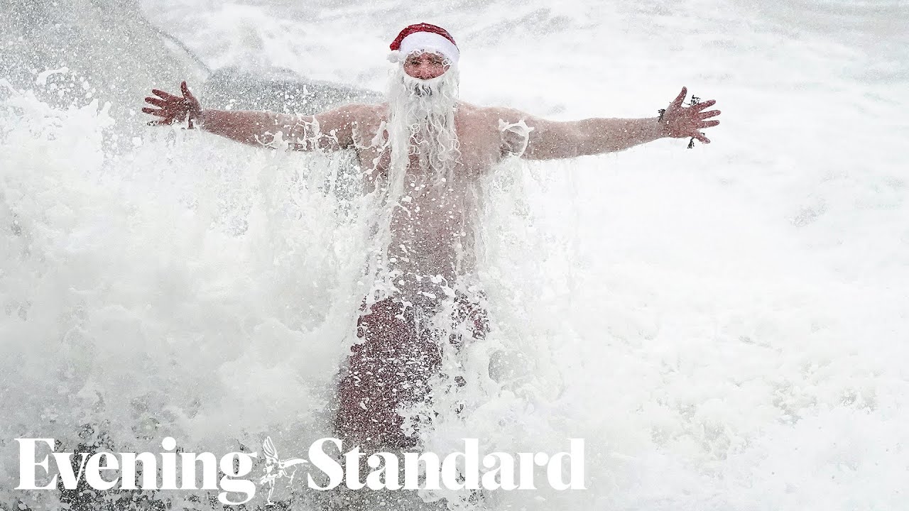 Plucky Swimmers Start Christmas Day With a Dip in the Sea | Evening Standard