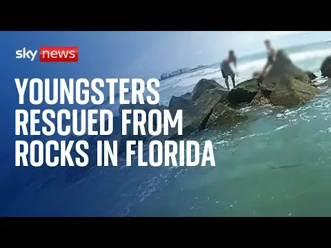 Florida: Stranded Swimmers Are Rescued From Rocks in Fort Pierce | Sky News