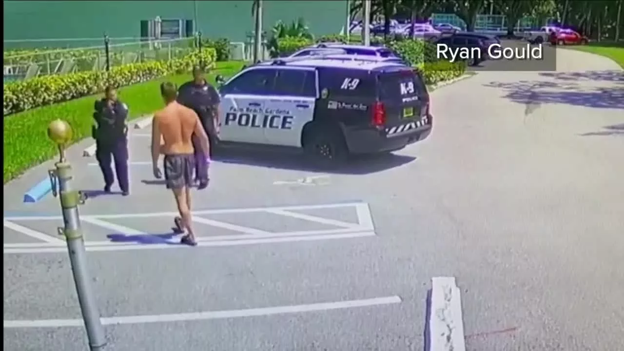 Palm Beach Gardens Officer Fired After Drawing Pistol on Swimmer | WPTV News