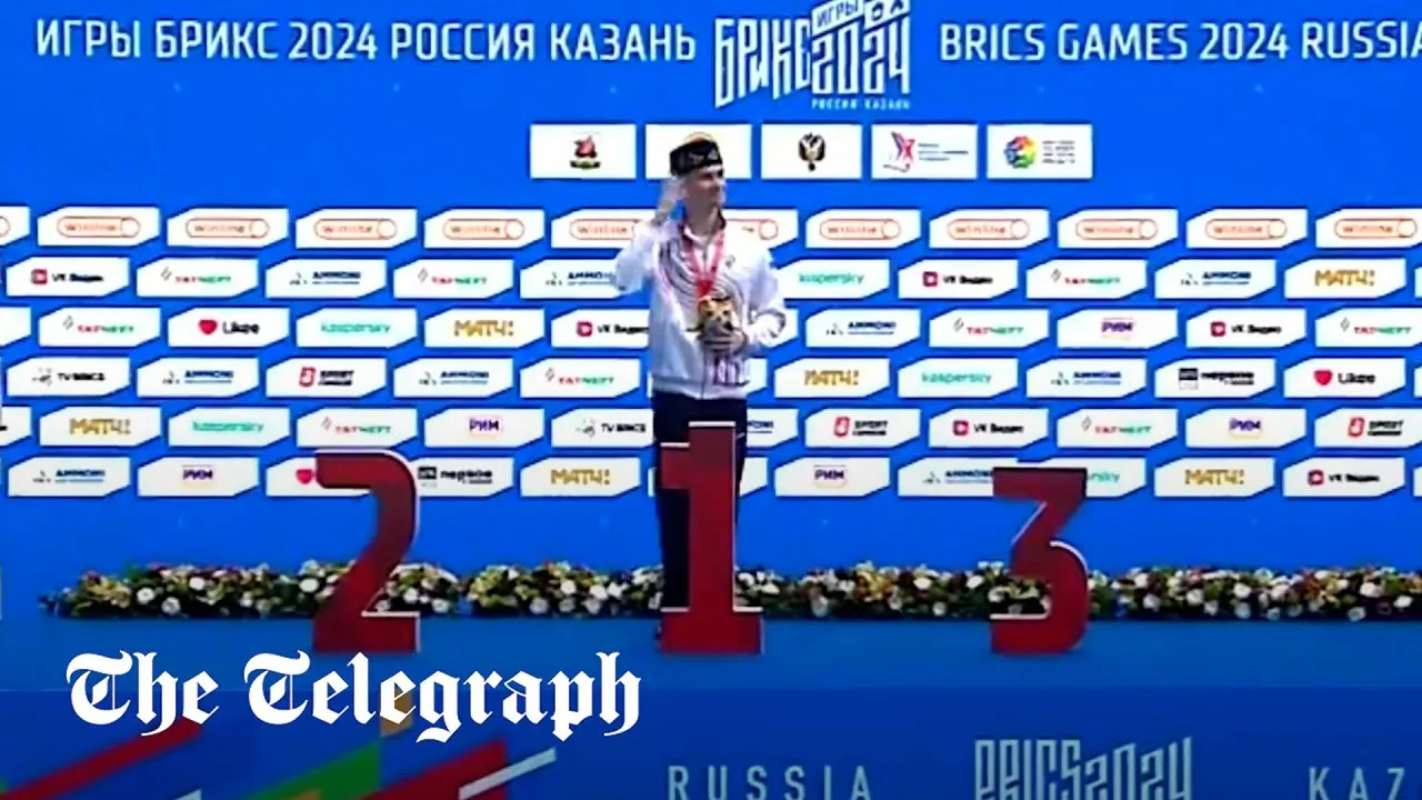 Moment Russian Swimmer Awarded Gold – But He Is The Only Contestant | The Telegraph